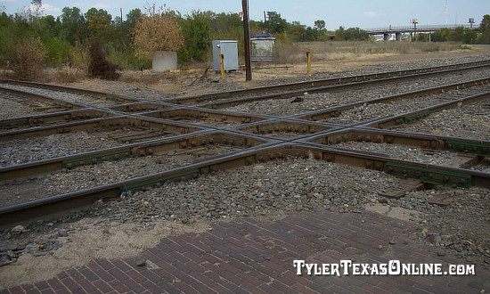The crossing of the Cotton Belt and I&GN tracks in downtown Tyler, Texas