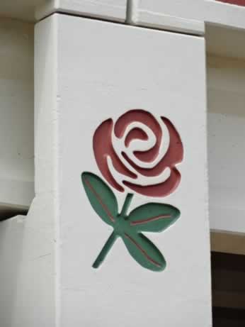 Close-up of Tyler rose logo on Loop 49 overpass in Tyler